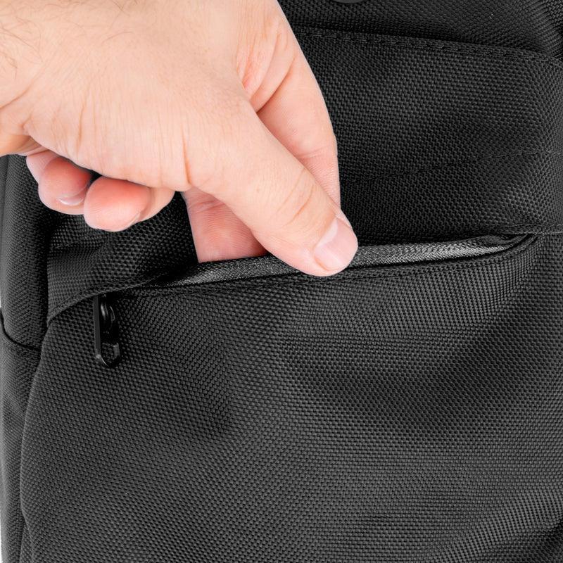Hand opening a zippered pocket on a black odor-proof backpack