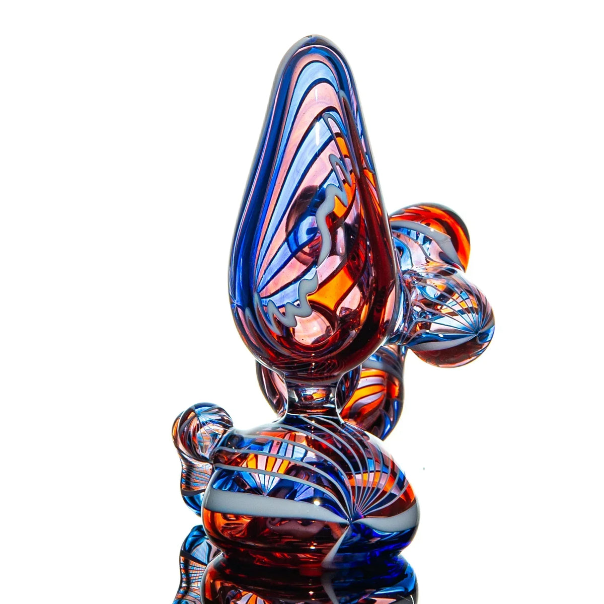 Heady glass art pipe with vibrant red, blue, and orange patterns on white background
