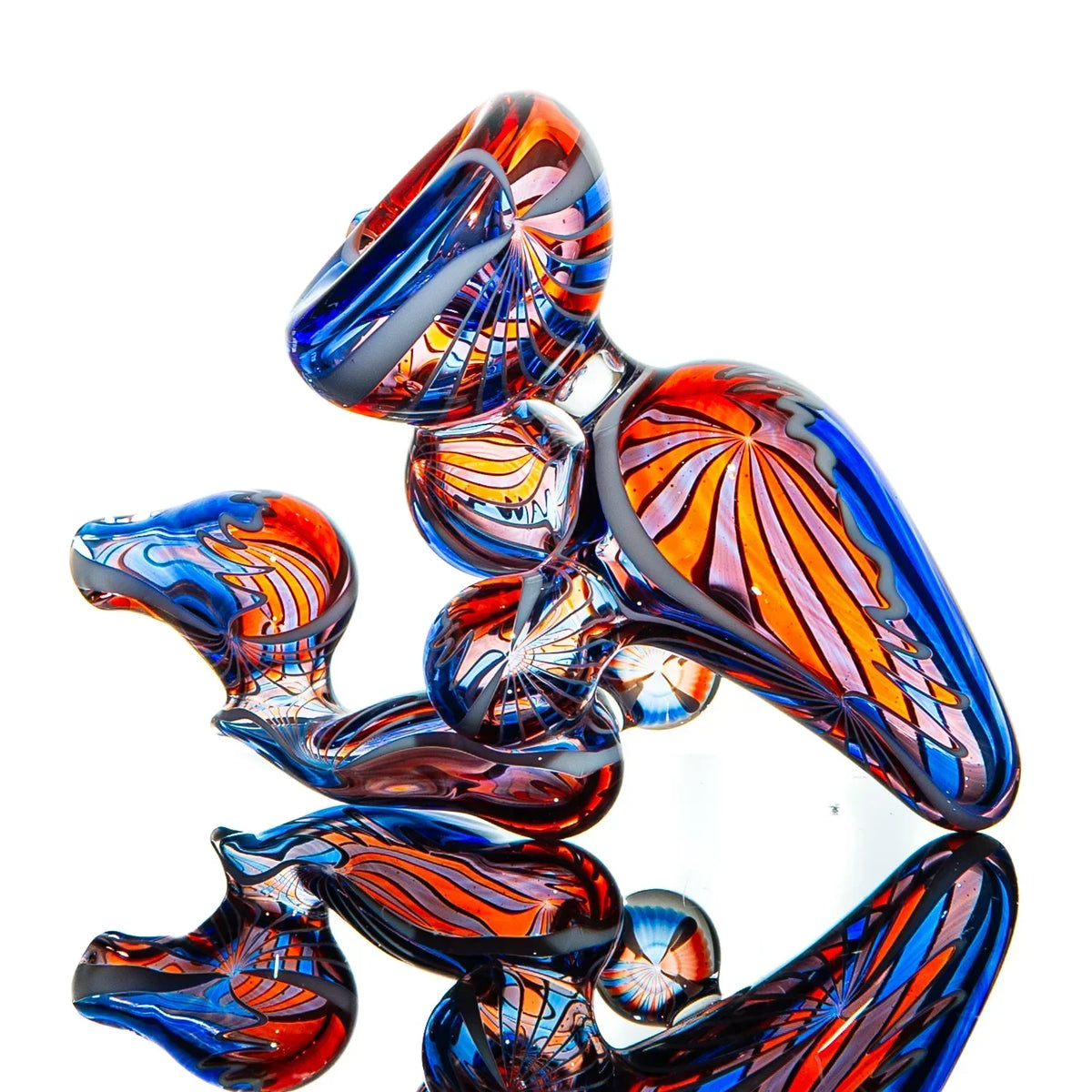 Colorful heady glass pipe with vibrant red, blue, and orange swirl patterns