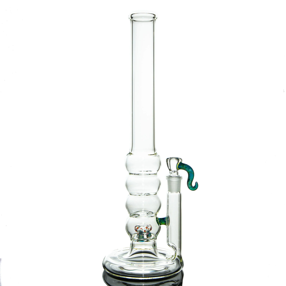 Clear glass water pipe with bubble chamber and decorative green handle on white background