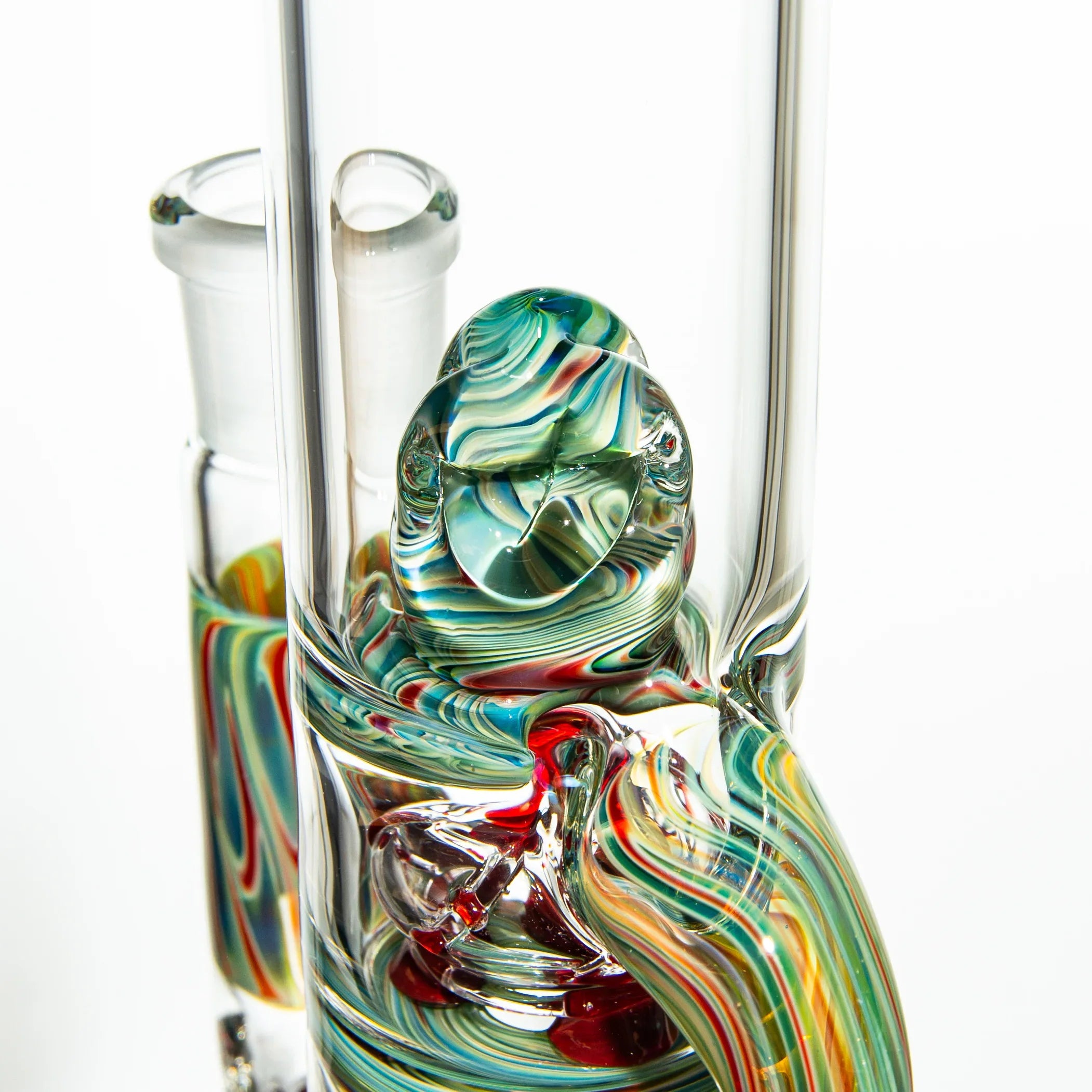 Close-up of colorful heady glass water pipe with multicolored marbled patterns