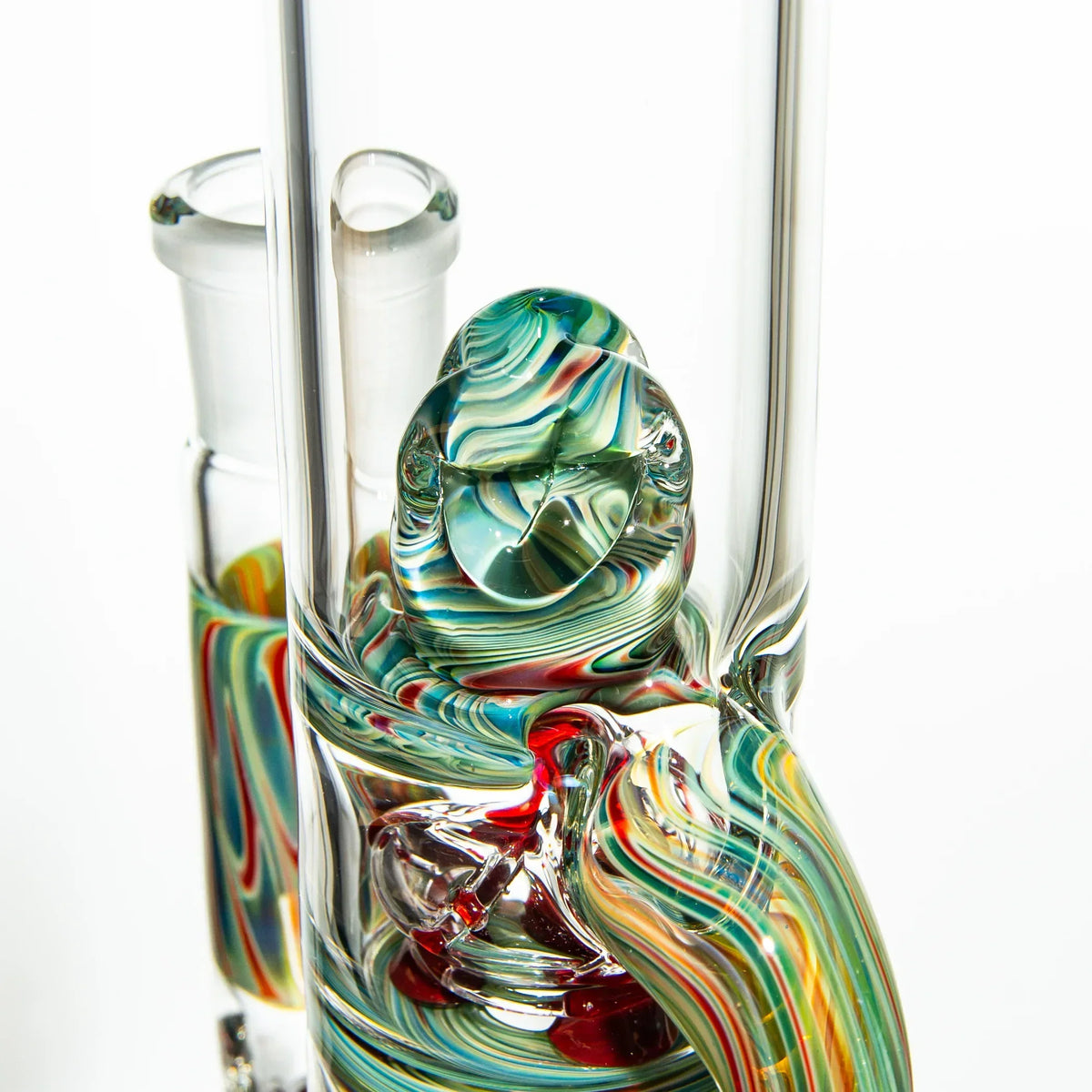Close-up of colorful heady glass water pipe with multicolored marbled patterns