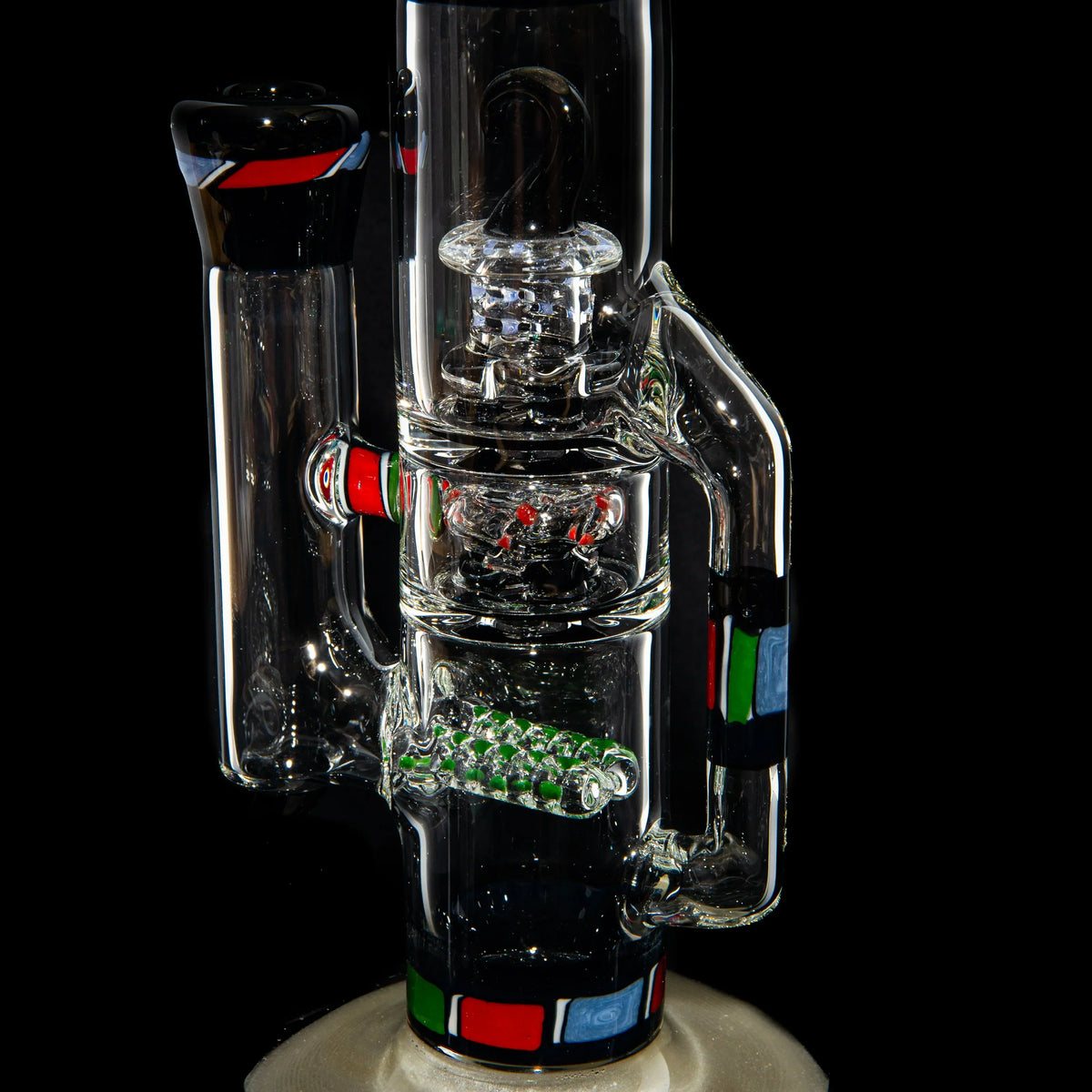 Heady glass water pipe with colorful accents, intricate percolator, and artistic design