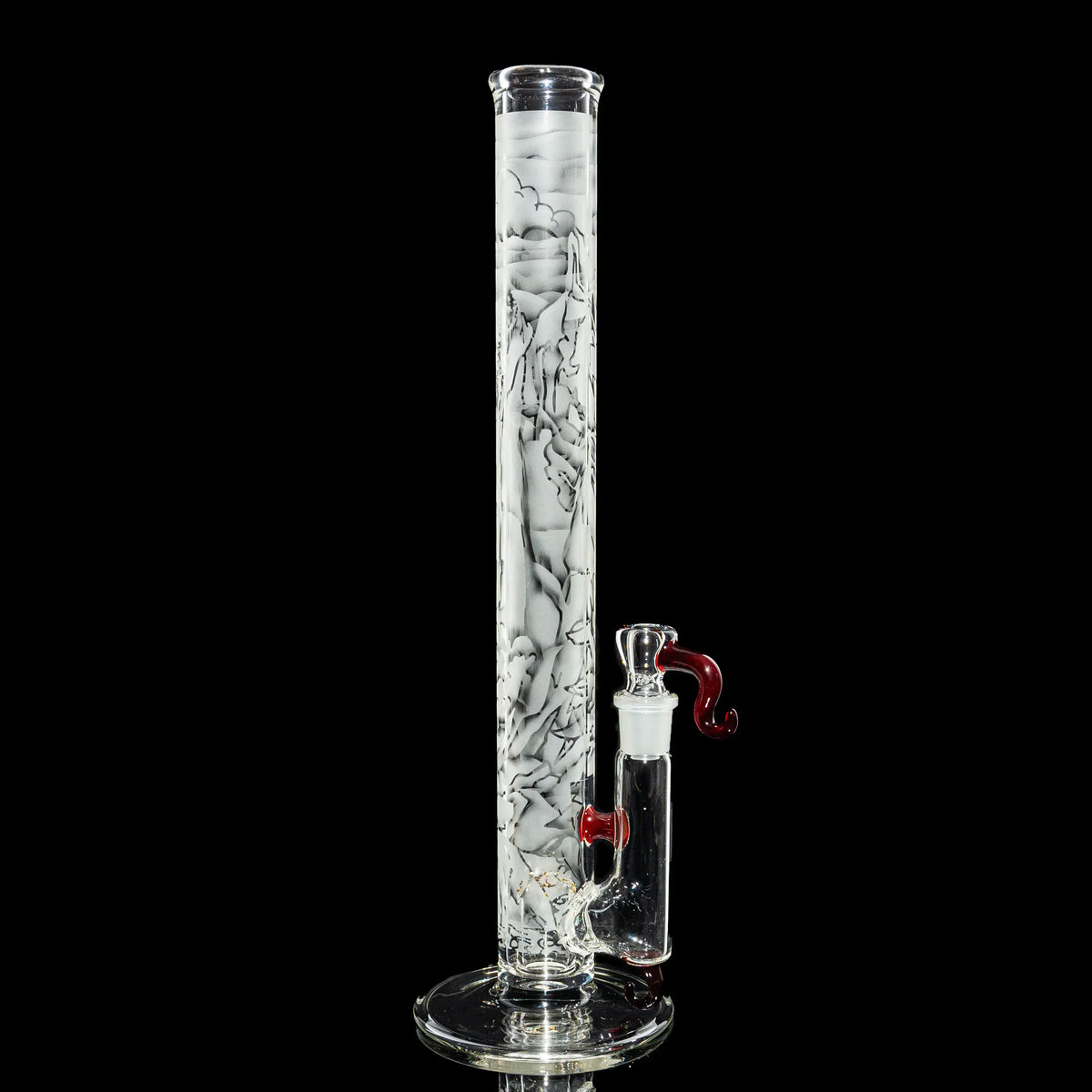 Tall glass water pipe with detailed smoked glass artwork and red accents, isolated on black background.