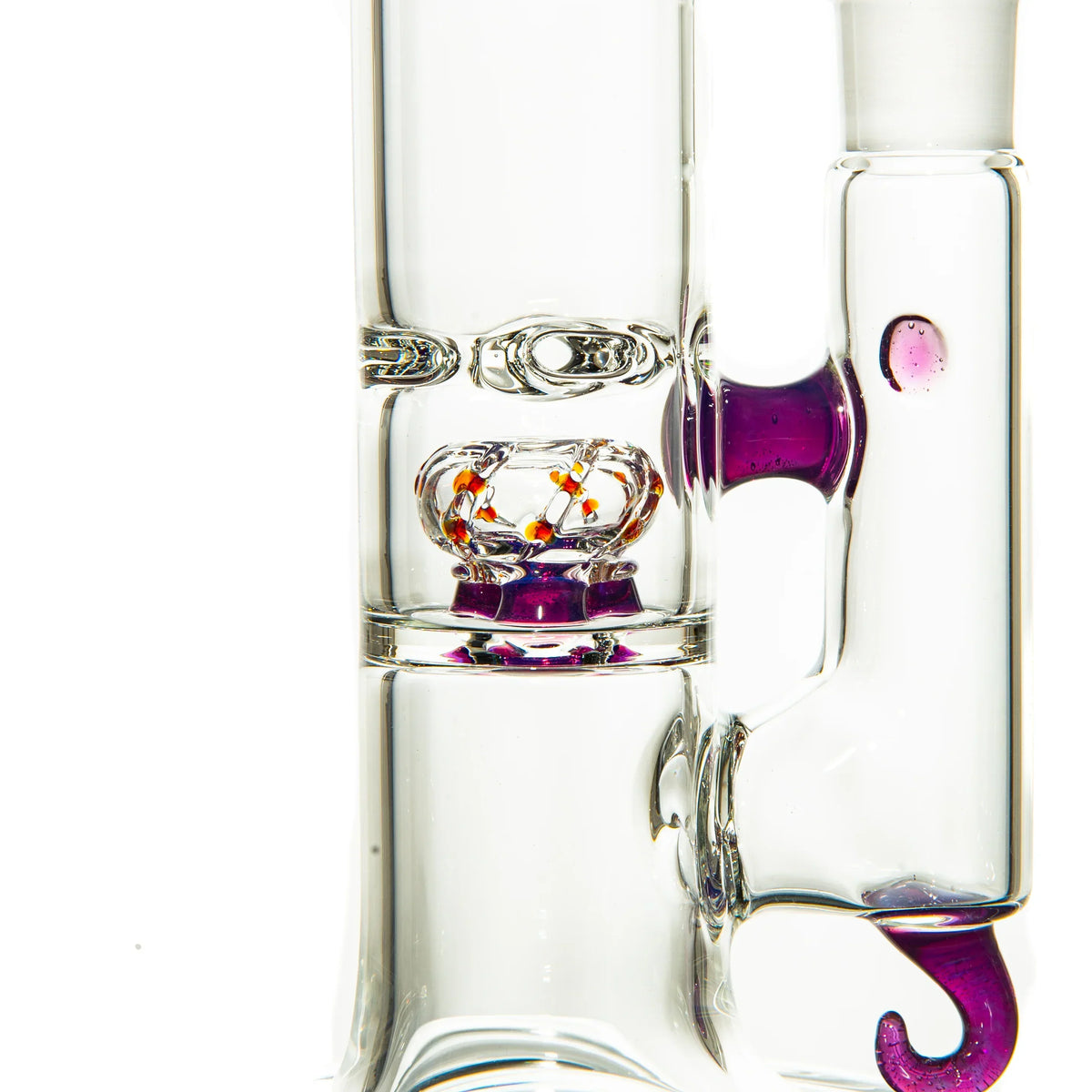 Clear glass water pipe with purple accents and an intricate percolator detail