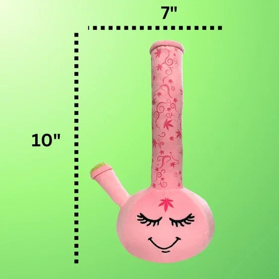 Pink glass bong with floral design and smiling face, 10-inch height, on green background.
