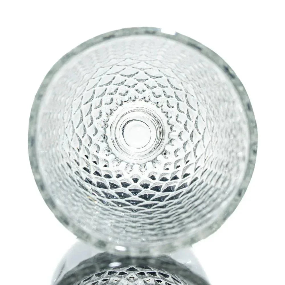 Textured clear glass bowl with pineapple pattern viewed from above, glass accessory photography