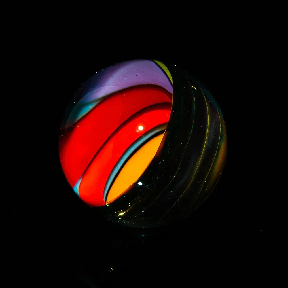 Colorful heady glass marble with vibrant swirls, gallery style on black background