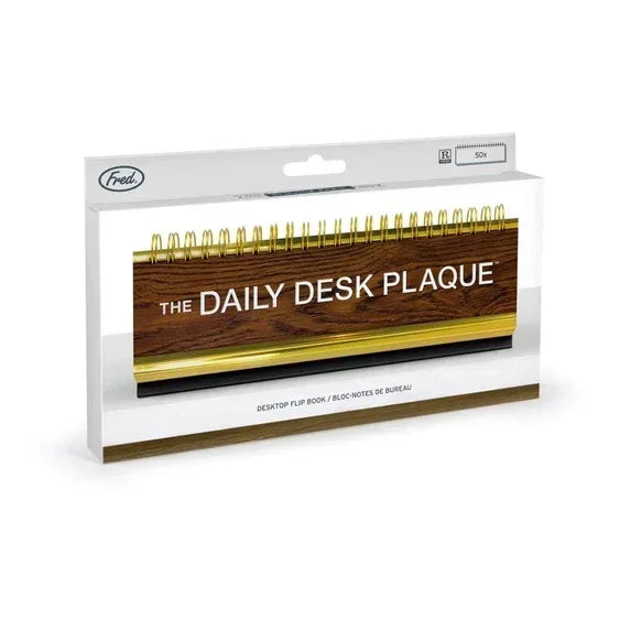 The Daily Desk Plaque spiral flip book in packaging, wood and gold office accessory.