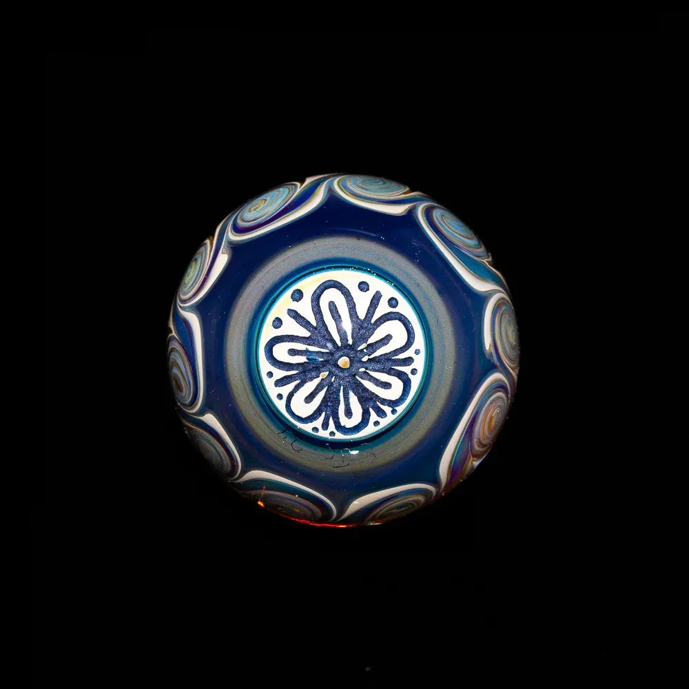 Handcrafted glass marble with blue and white flower pattern, artistic smoking accessory