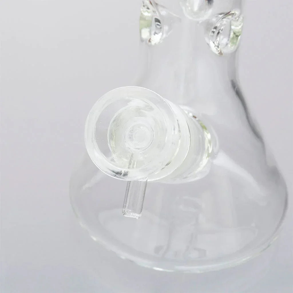 Clear glass mini beaker bong base with side view of downstem and water chamber