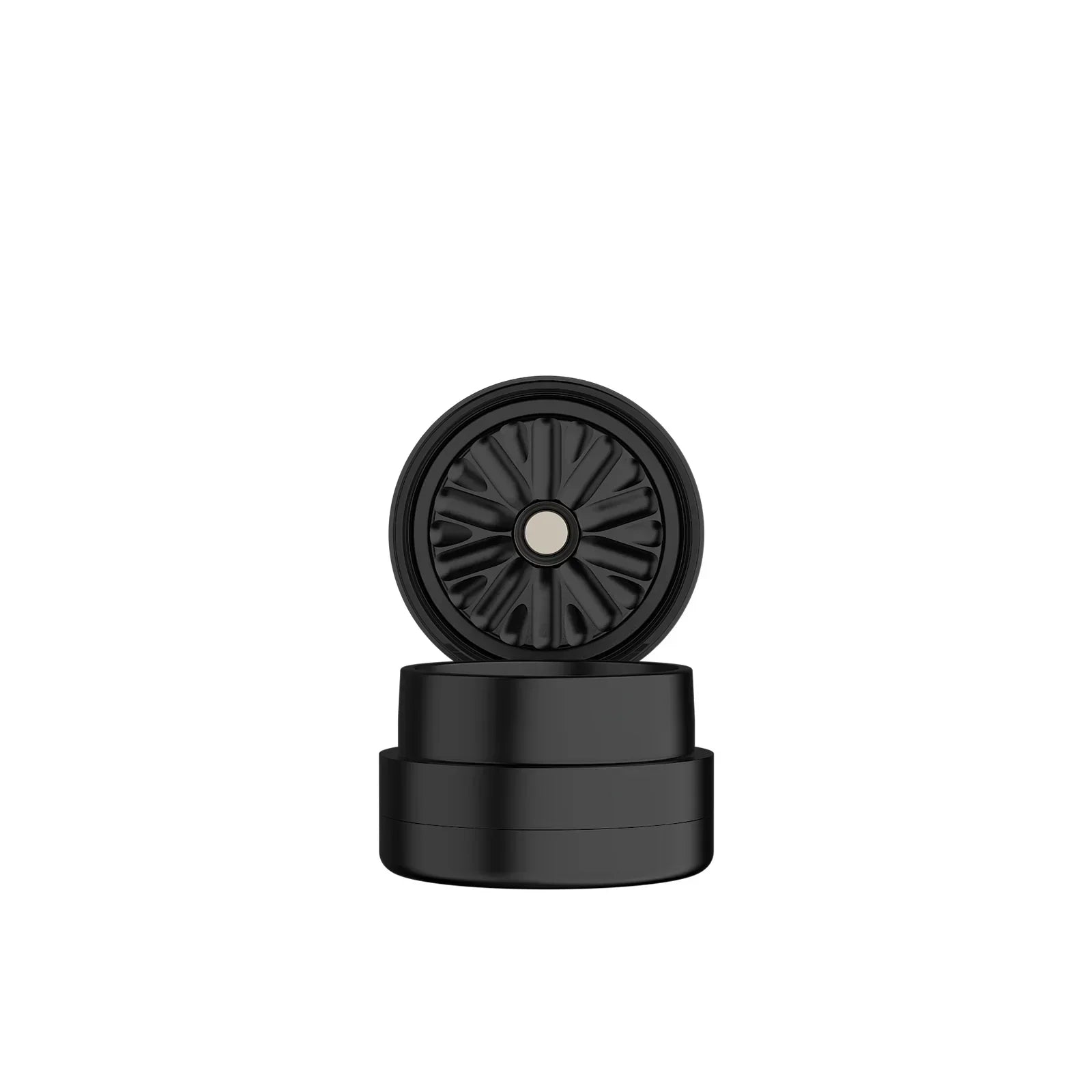 Black 3-piece herb grinder with open top showing grinding teeth, isolated on white