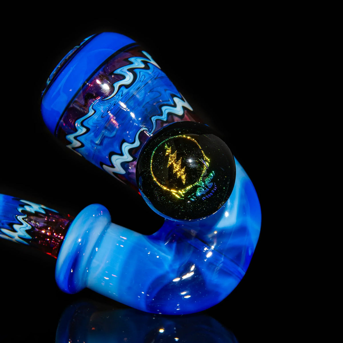 Heady glass hand pipe with blue swirled design and unique glass art accent