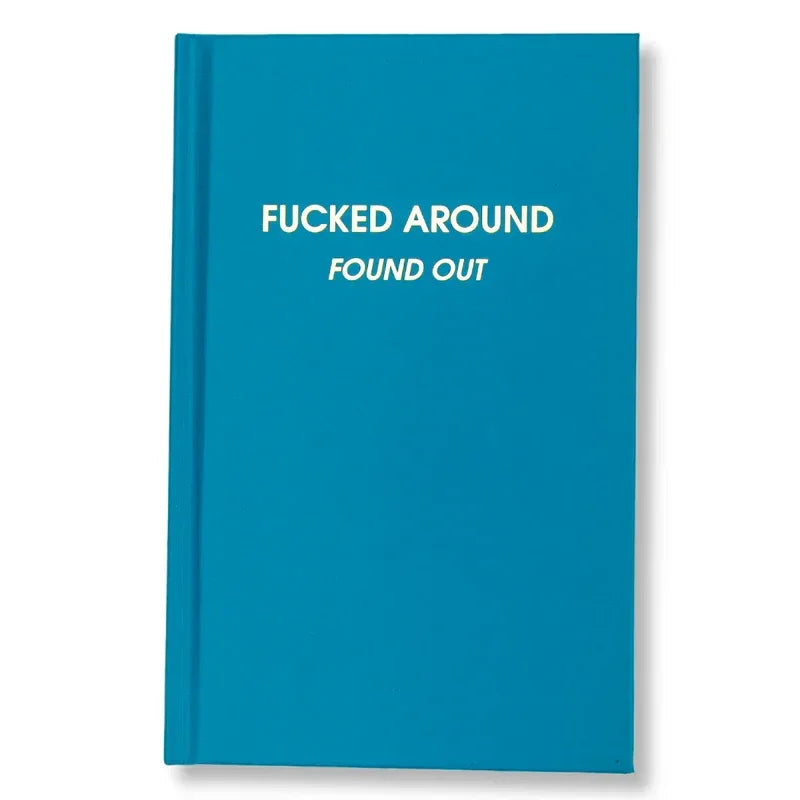 Blue hardcover notebook with bold white text on cover, humorous phrase, novelty gift idea