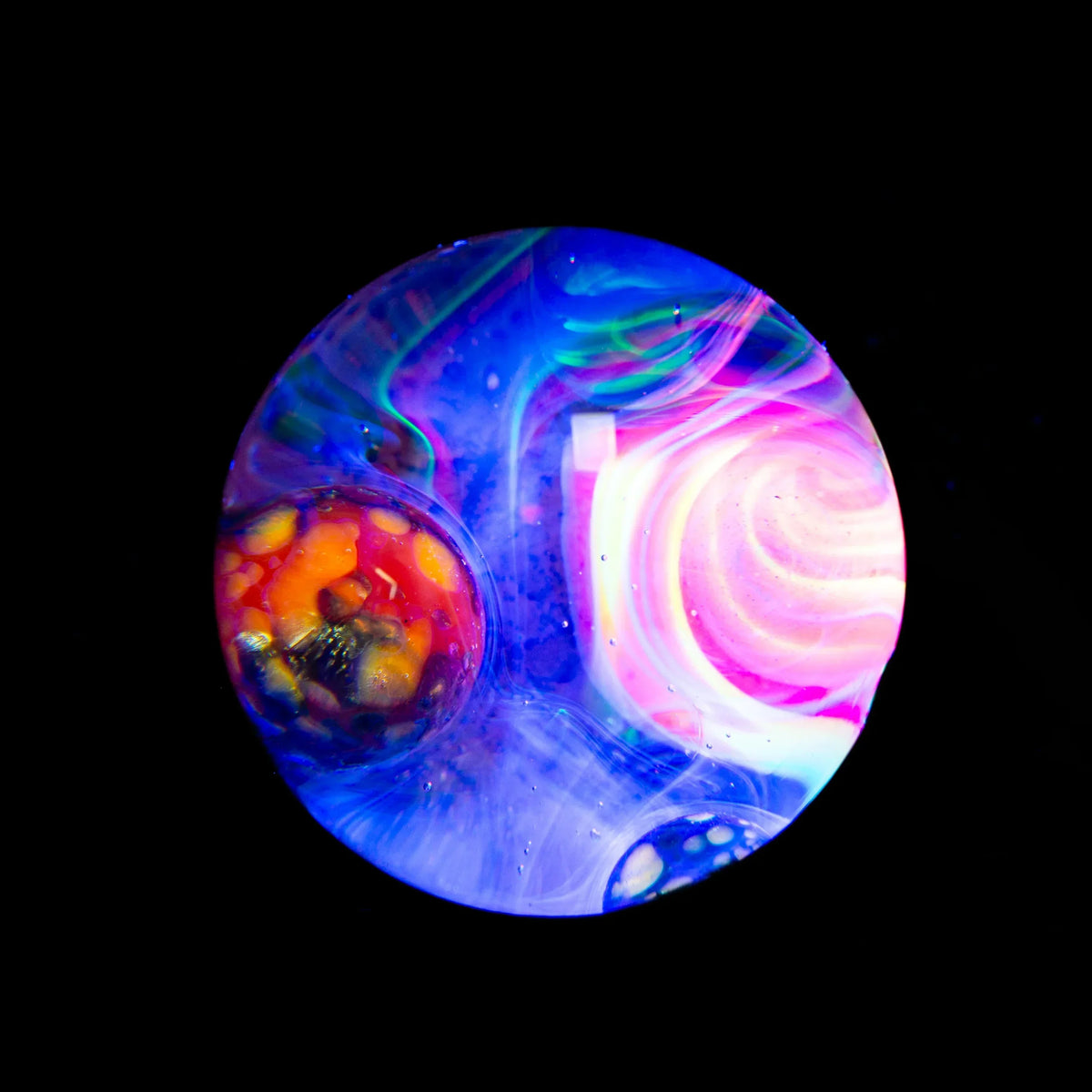 Colorful heady glass art marble with swirling neon patterns and vibrant details on black background