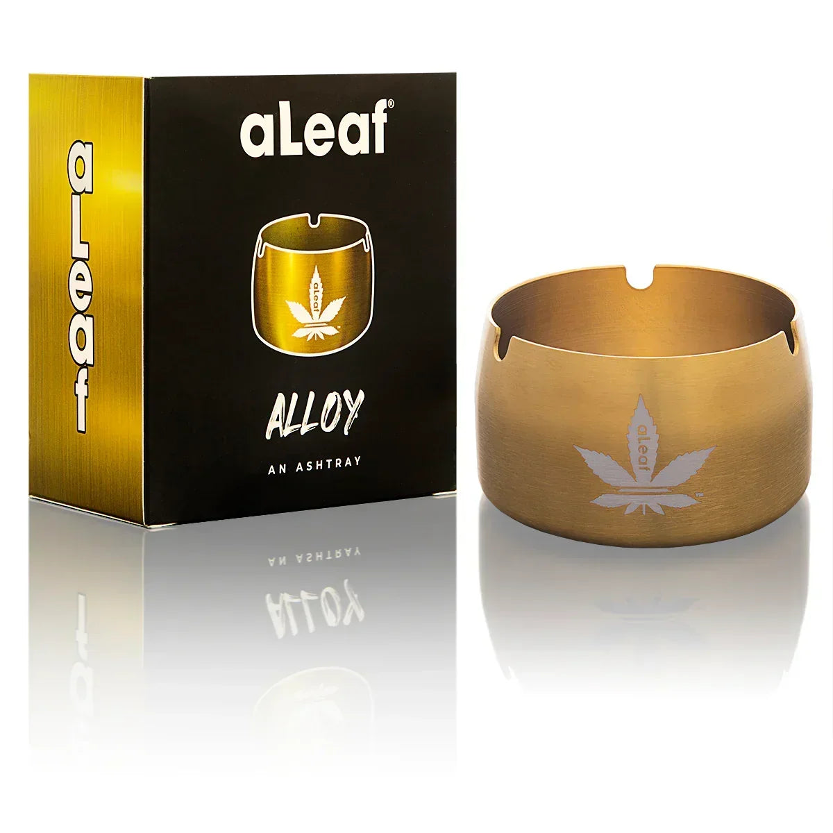 Gold metal alloy ashtray with leaf engraving, displayed next to matching product box