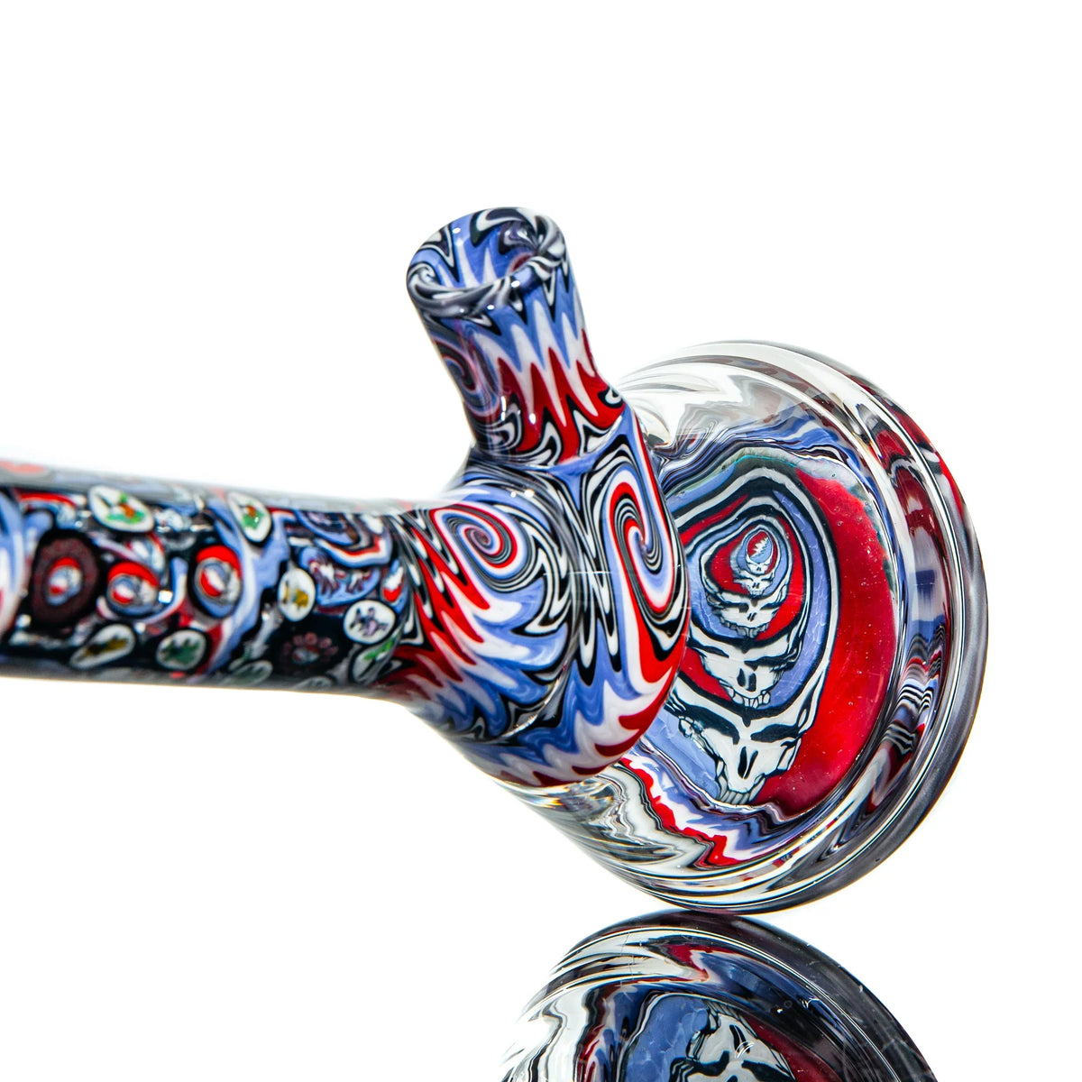 Colorful heady glass water pipe with red, blue, and white swirls and skull artwork base
