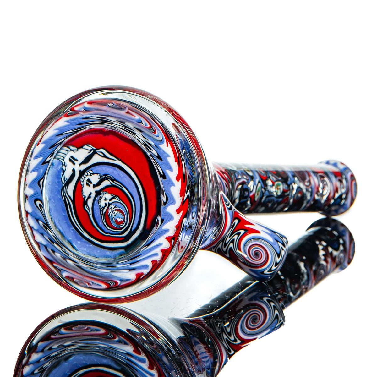 Hand-blown glass bong with psychedelic red, blue, and white spiral art design