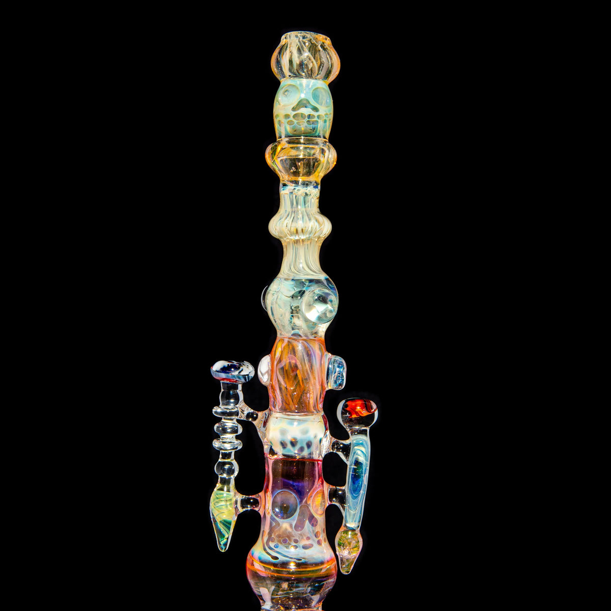 Colorful heady glass water pipe with intricate details on black background