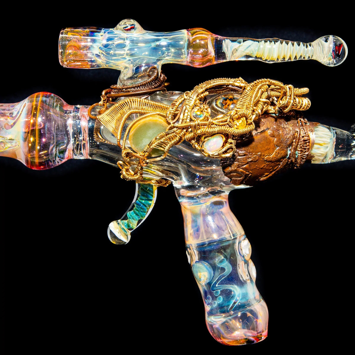 Heady glass pipe with intricate wire wrapping and opal accents on black background