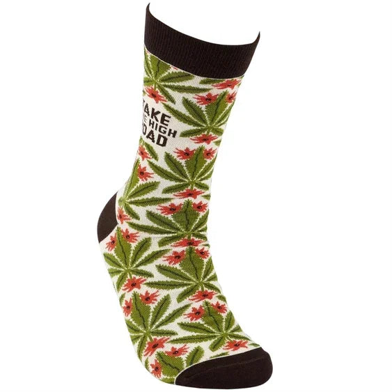 Crew sock with green leaf and red flower pattern, black heel and toe, text "Take the High Road"