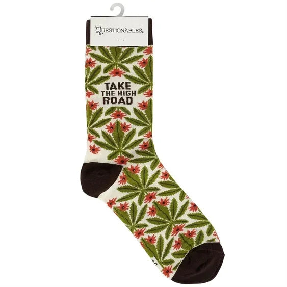 Novelty crew sock with green leaf pattern, red accents, and 'Take the High Road' text.