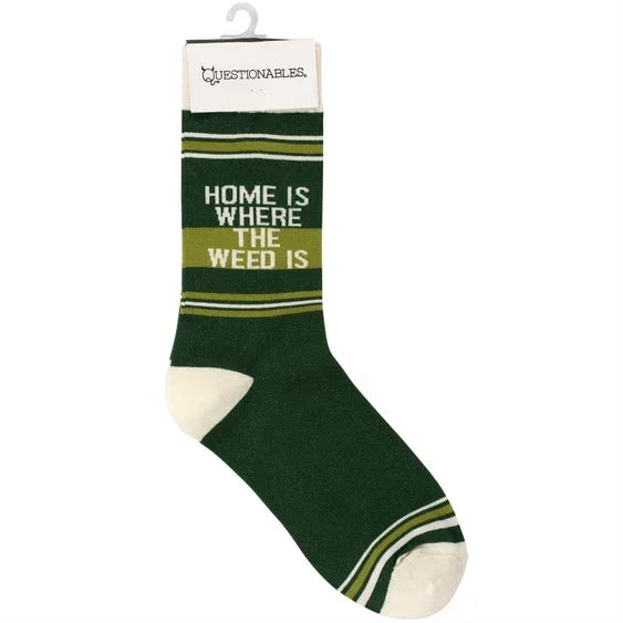 Green sock with white accents and text that reads 'Home is where the weed is'.