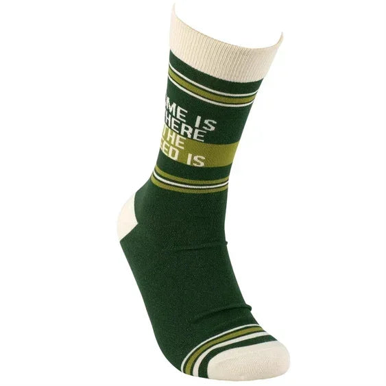 Green and cream crew sock with stripes and partial text, novelty cozy footwear