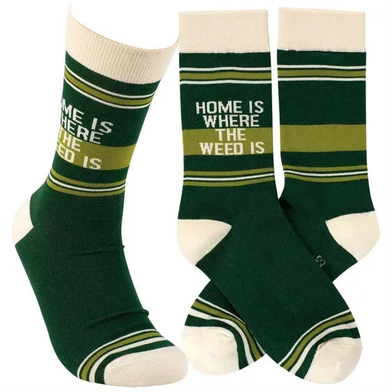 Green and white crew socks with 'Home is where the weed is' text and striped design
