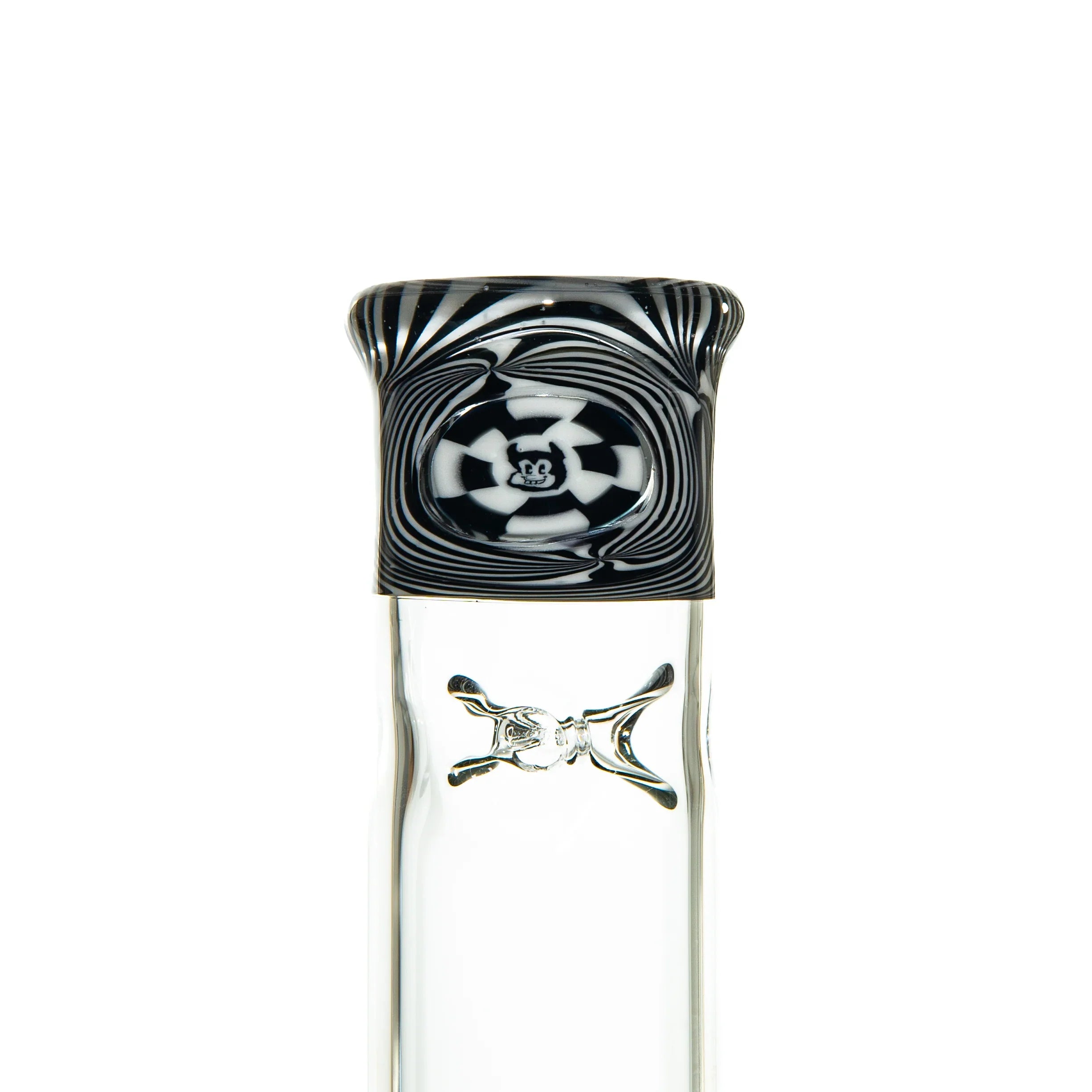 Heady glass bong with black and white swirl pattern, clear body, and skull crossbones detail.