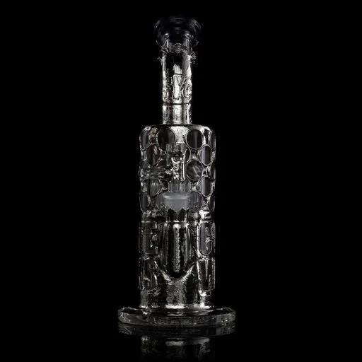 Artistic glass water pipe with intricate patterns on black background, heady glass accessory
