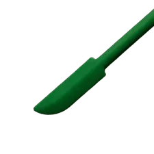 Green silicone dab tool with a flat, angled tip for concentrate handling