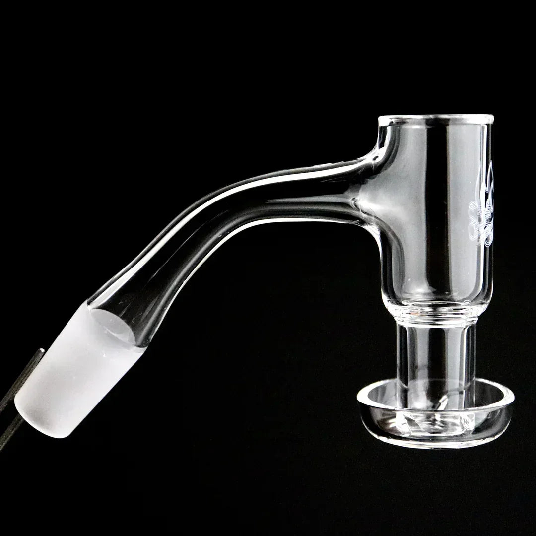 Clear quartz banger dab nail with frosted joint for glass water pipe on black background
