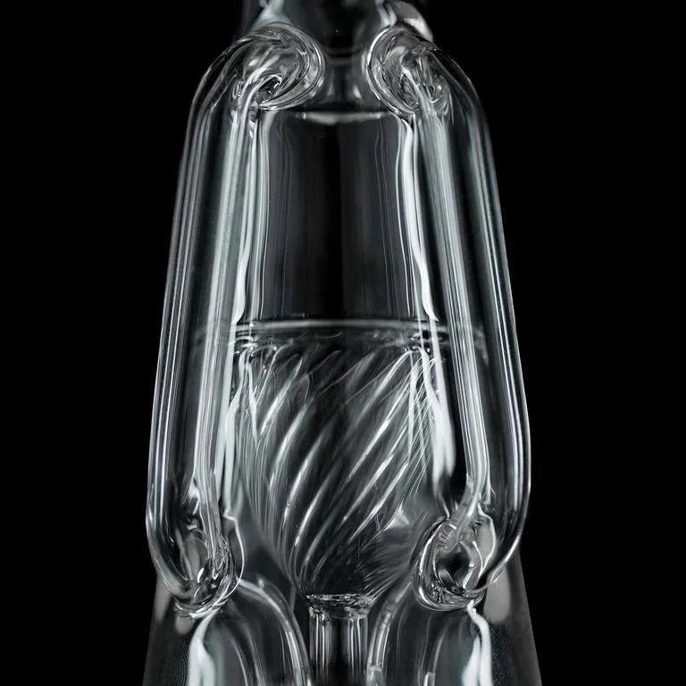 Close-up of intricate clear glass water pipe with twisted percolator detail on black background