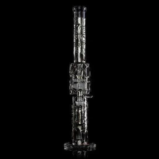 Artistic clear glass water pipe with intricate details on a black background