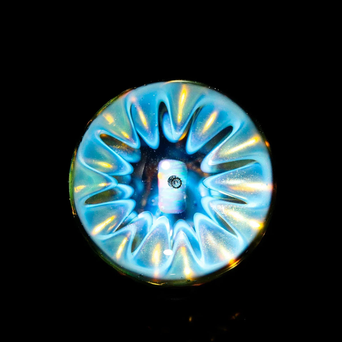 Glass pendant with vibrant blue and white swirling pattern, viewed from above
