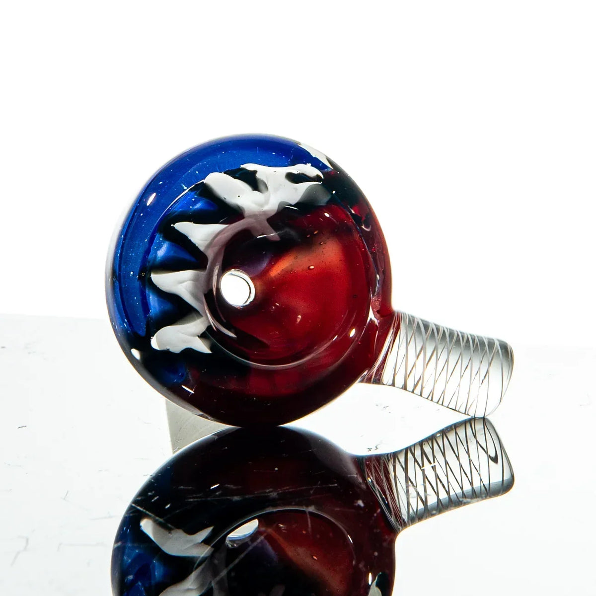 Heady glass pipe with red, blue, and white artistic swirl design, clear twisted handle