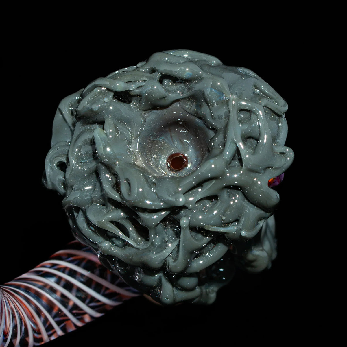 Hand-blown glass pipe with intricate gray sculpted bowl and twisted glass stem