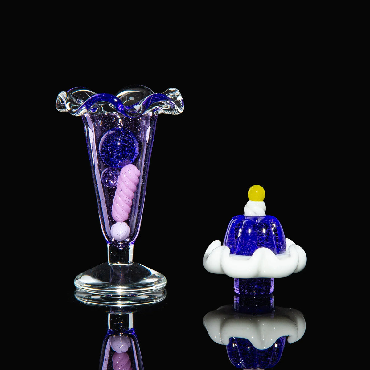 Colorful glass carb cap set with dessert-inspired designs, perfect for dab rigs and accessories
