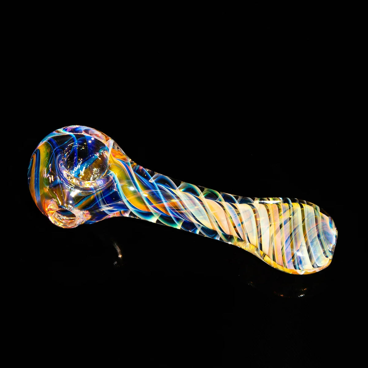 Colorful hand blown glass pipe with swirling patterns on a black background