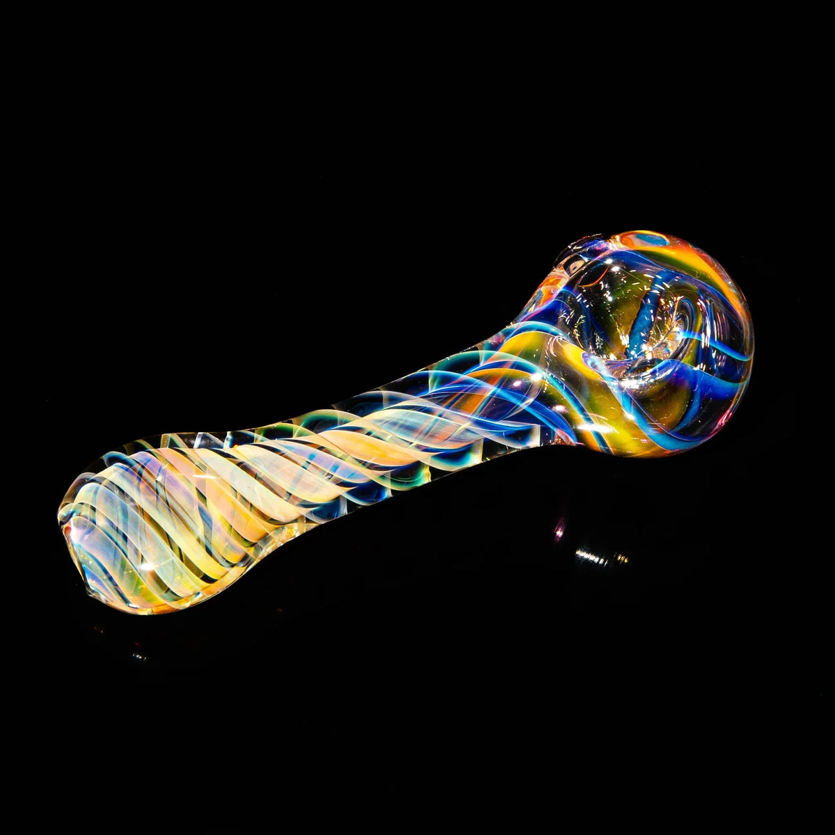 Hand blown rainbow swirl glass pipe with vibrant colors on a black background