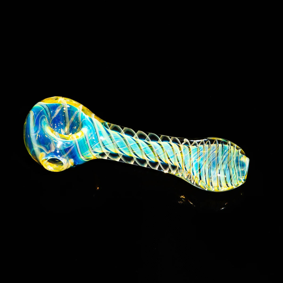 Colorful glass hand pipe with swirling yellow and blue patterns on a black background