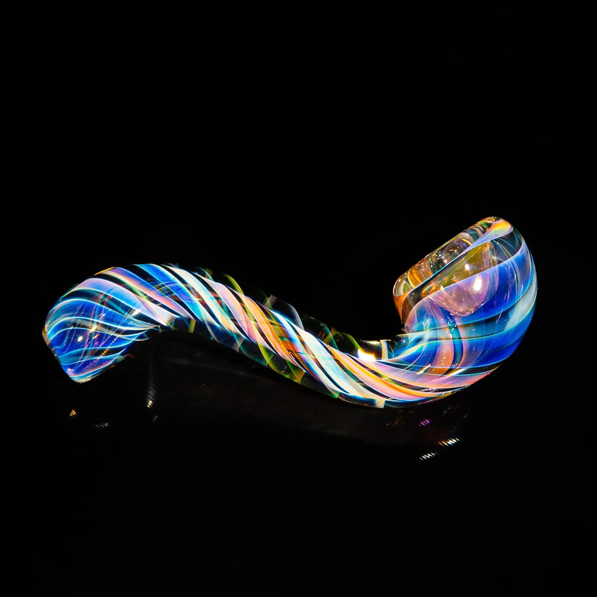 Colorful hand-blown glass pipe with swirling patterns on black background