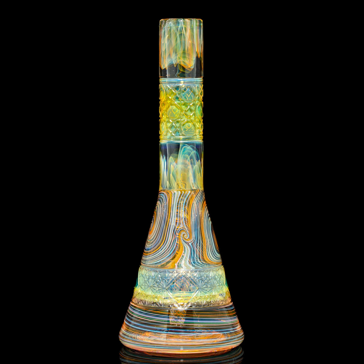 Heady glass water pipe with colorful swirled patterns and intricate designs on black background