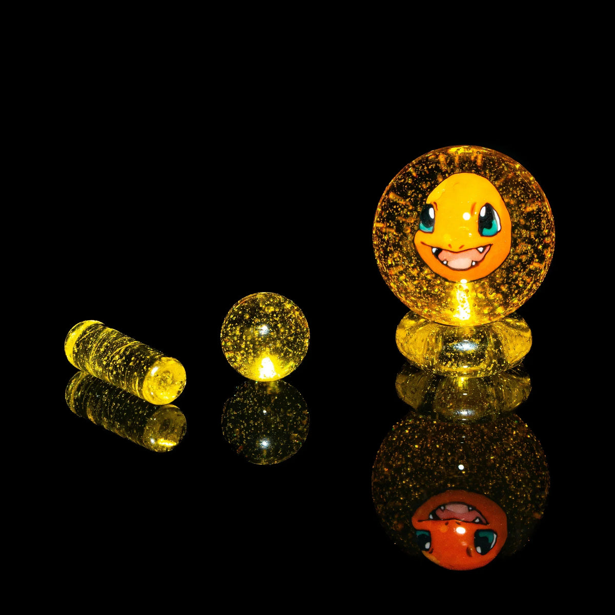 Yellow glass terp slurper set with cartoon face, glitter accents, three-piece dabbing accessory