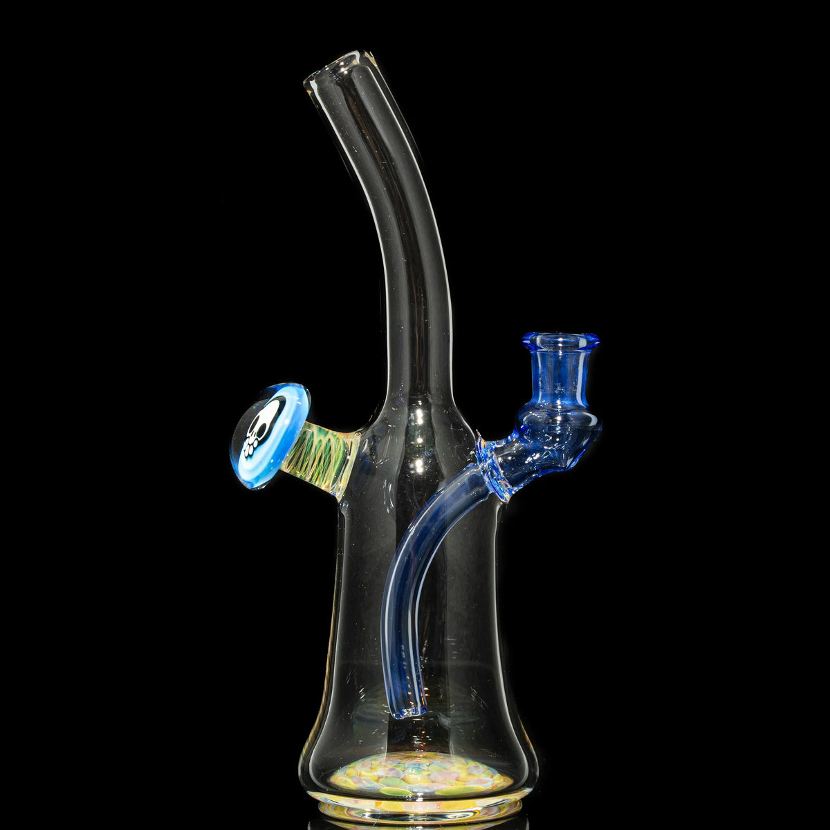 Clear glass water pipe with blue accents and skull detail, displayed on black background