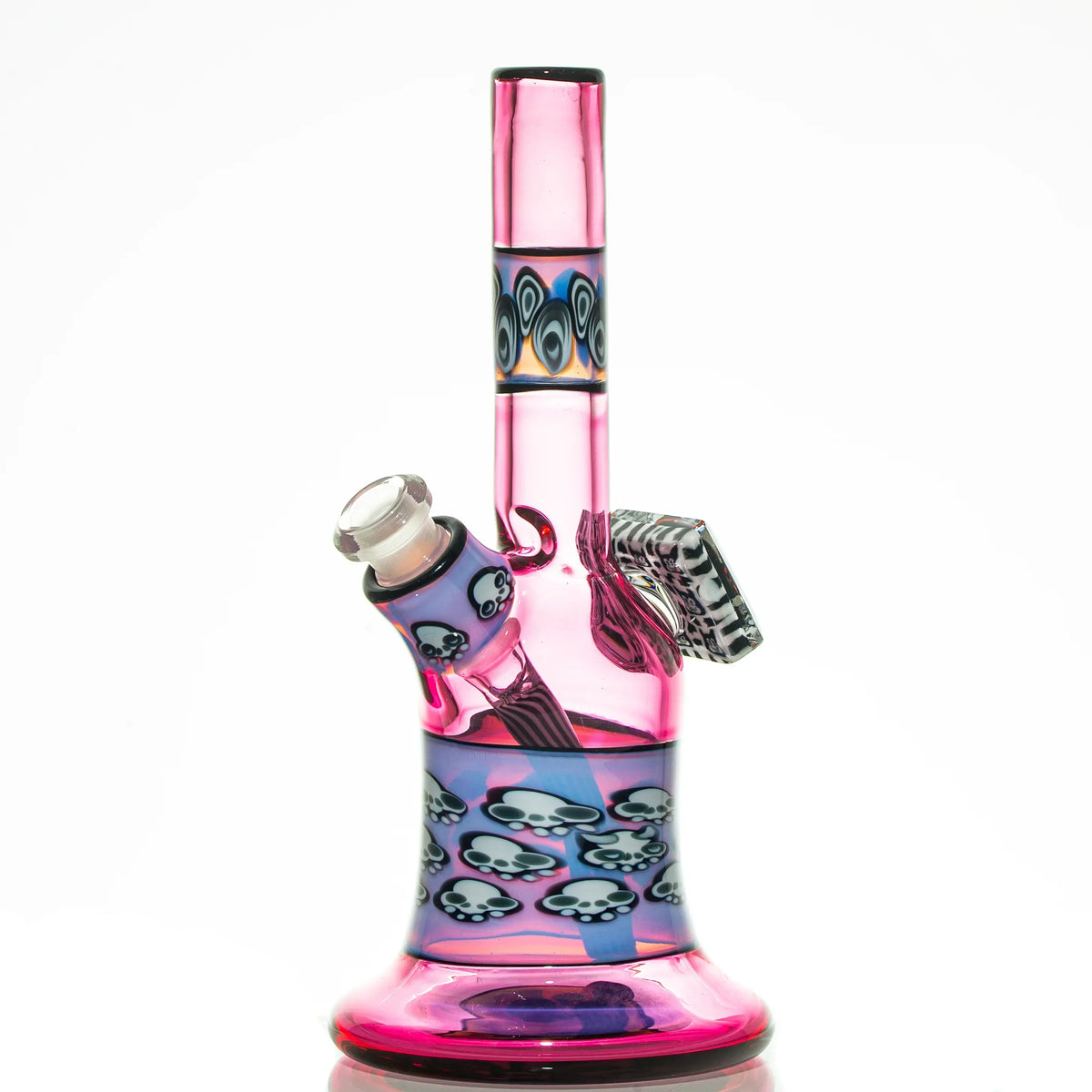 Pink and blue glass water pipe with skull designs and intricate patterns, on white background