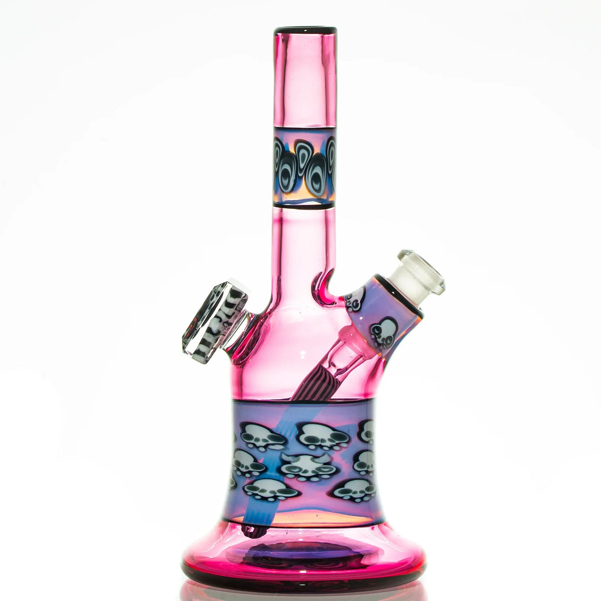 Pink glass water pipe with skull decals, heady glass piece on white background