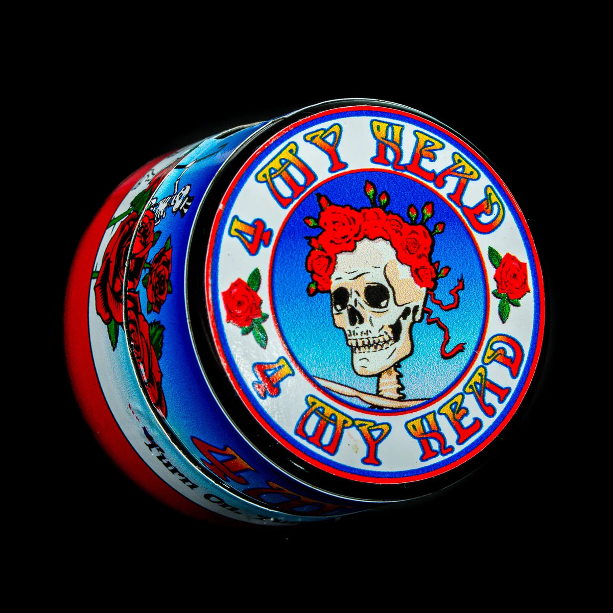 Colorful herb grinder with skull and red rose design on lid, text reading '4 My Head'