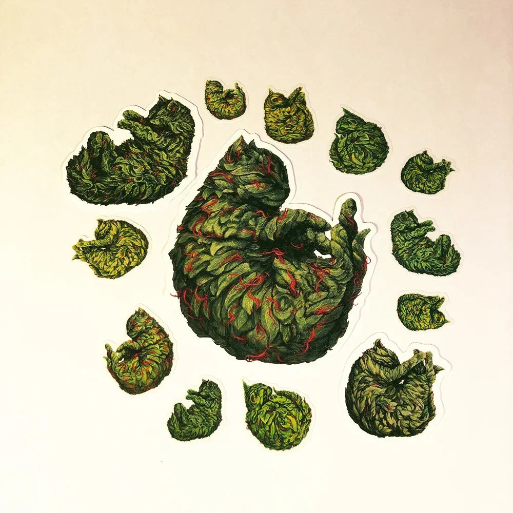 Sticker pack with curled cat shapes resembling green leafy buds on a white background